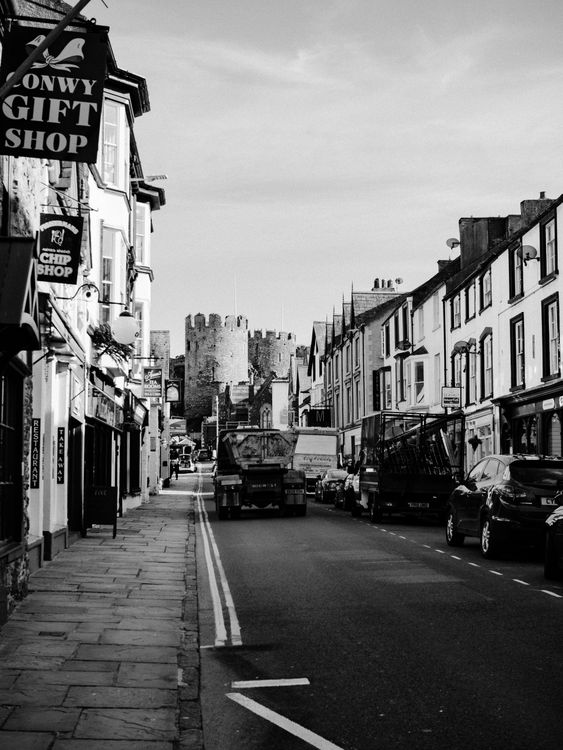 Grayscale Photo of an Old Town · Free Stock Photo