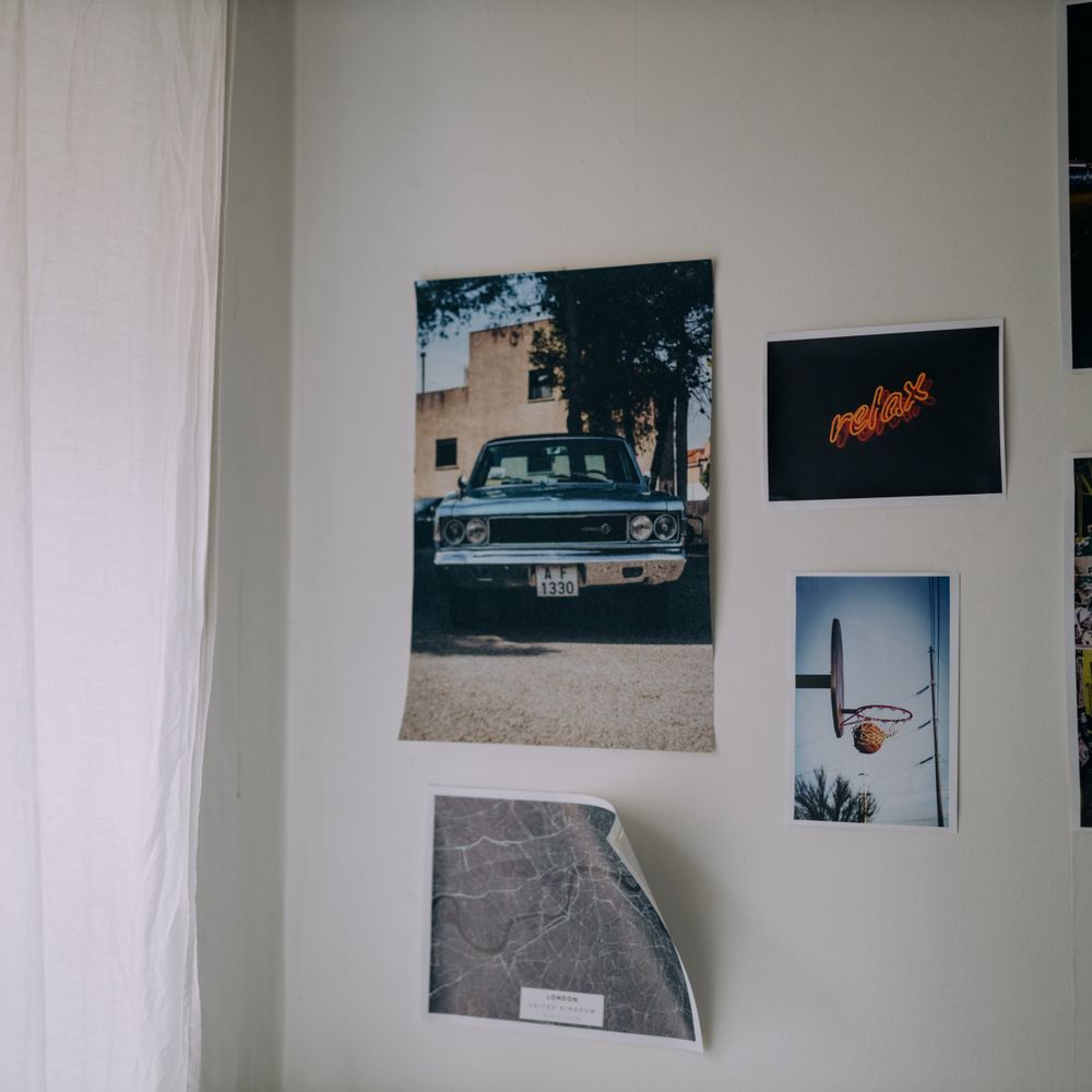 Wallpapering in Kingston Vale — woodwork brushed to a crisp, smooth line