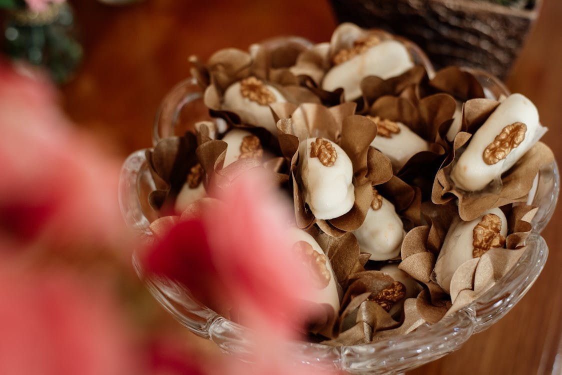 Delicious White Chocolates in a Glass Bowl 