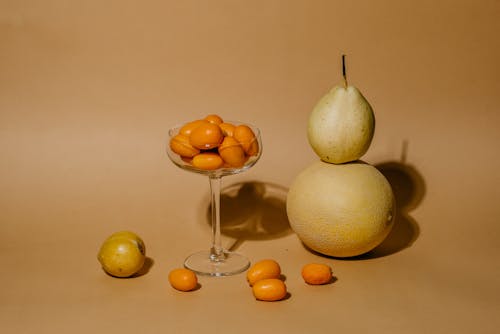 Assorted Fruits over Brown Surface