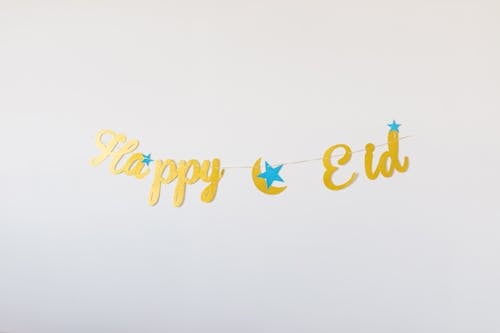 Free Golden Happy Eid Text Stock Photo