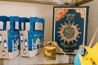 Blue and Gold Book on White Table
