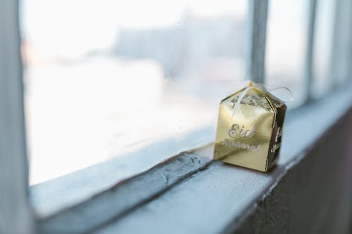 Golden Gift Box By The Window