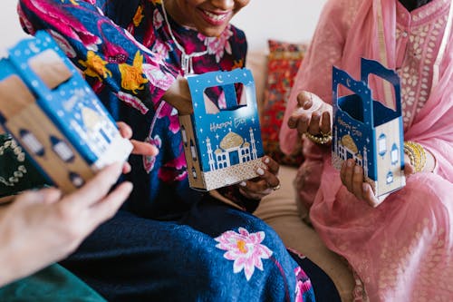 Crop Photo Of Women Holding Gift Boxes