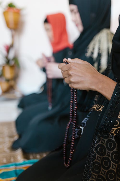 Women Praying In A Room