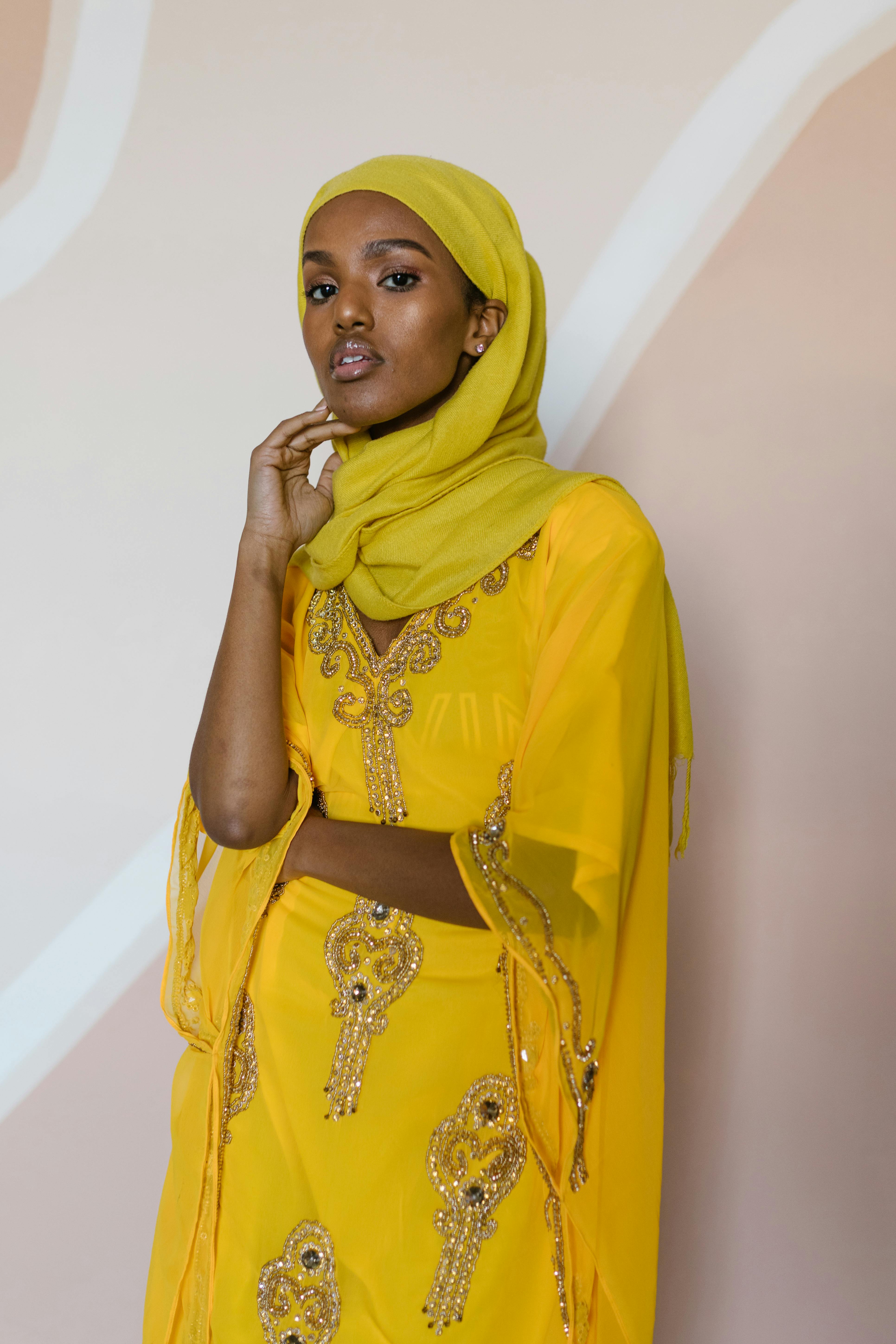 Woman in Yellow Hijab and Yellow Floral Sari · Free Stock Photo