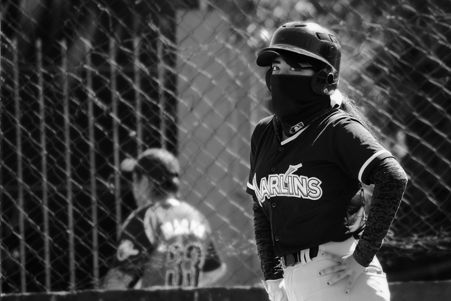 Person Wearing a Uniform Playing Baseball