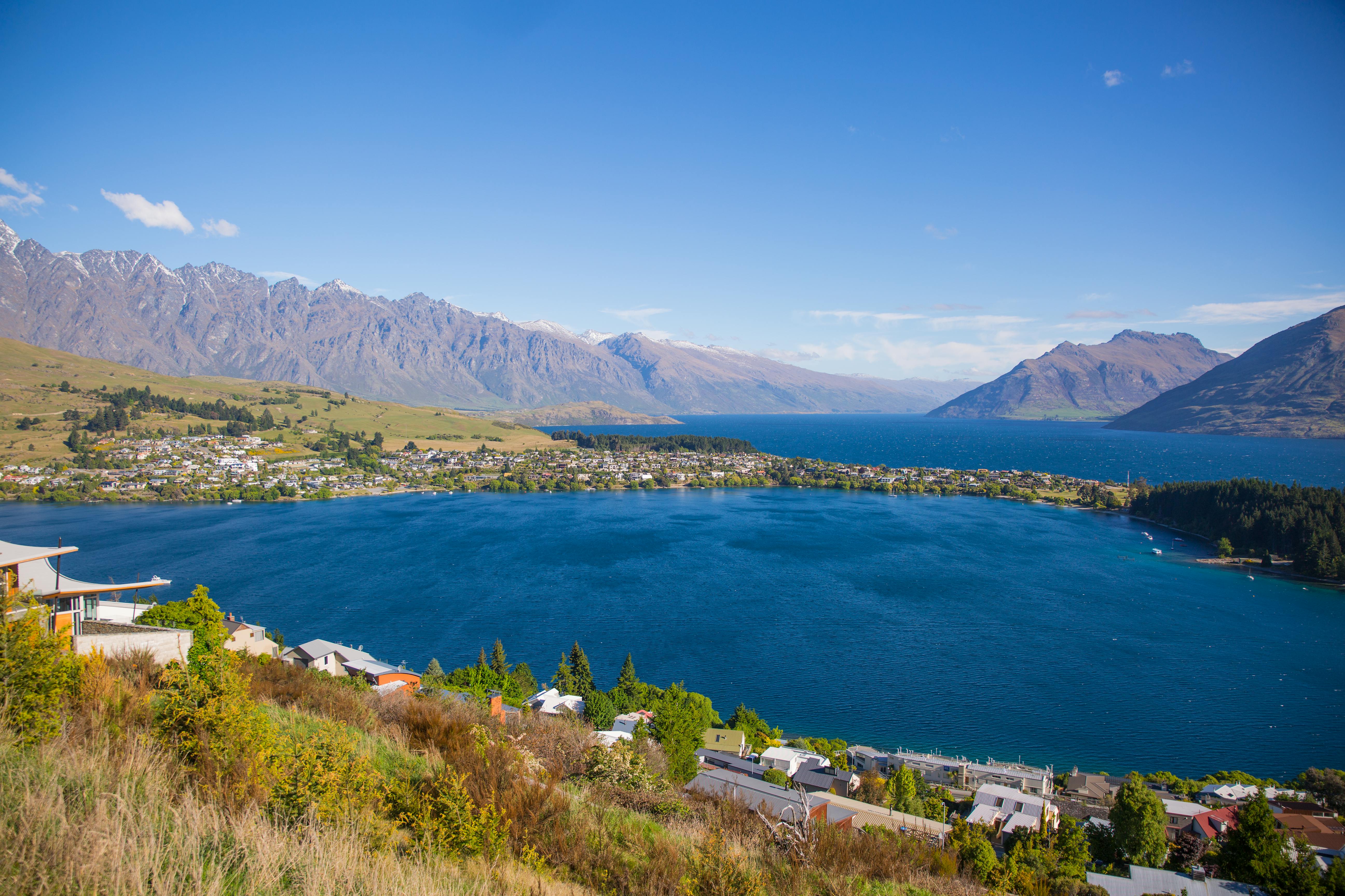 Silhouette of Mountain Near the Body of Water Photo in Daytime · Free ...