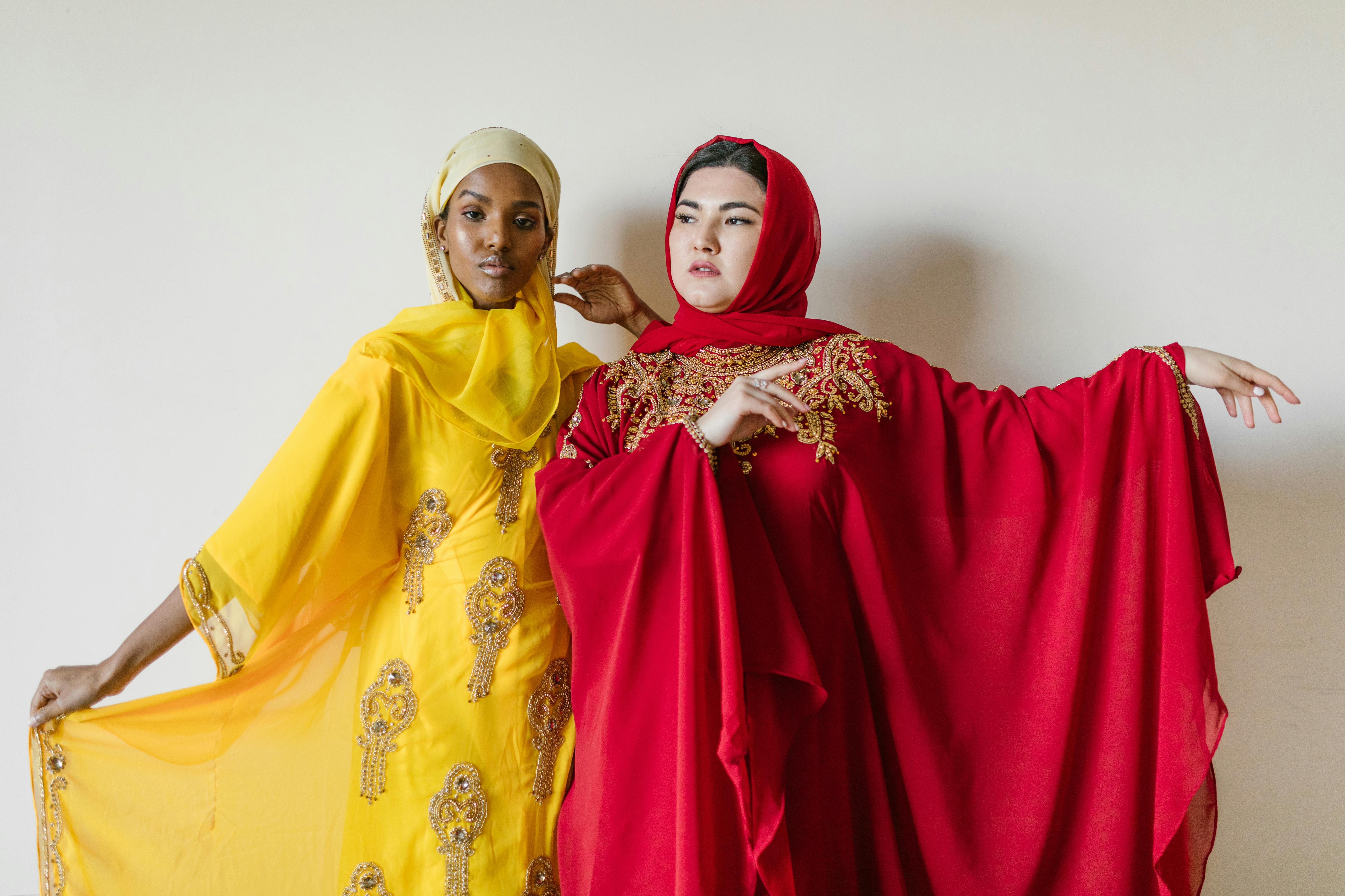 woman in yellow hijab and red abaya