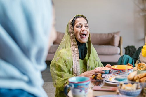 Smiling Woman in Green Hijab 