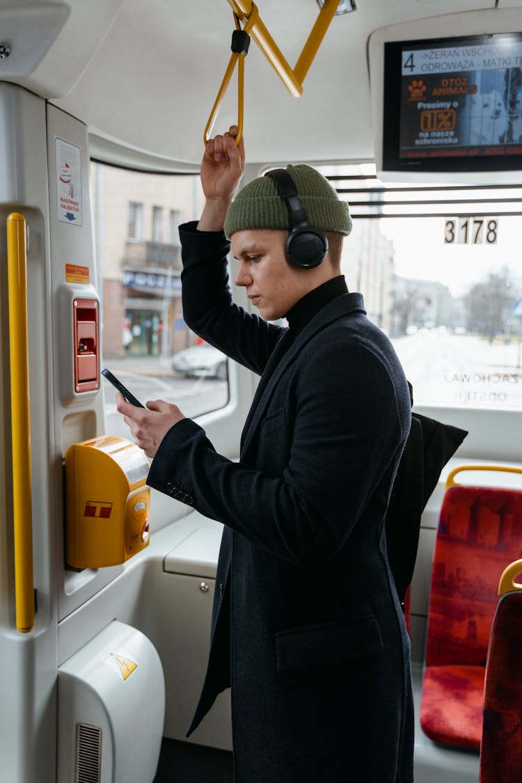 A Man Riding The Bus