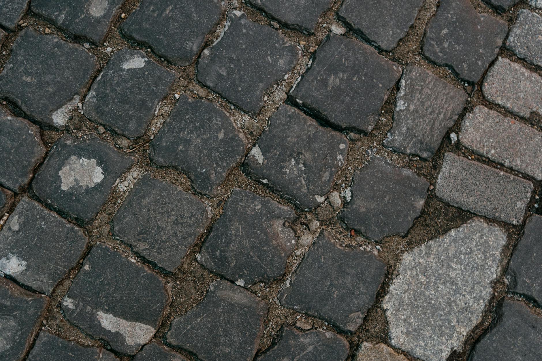 Detailed view of cobblestone pavement showing texture and arrangement.