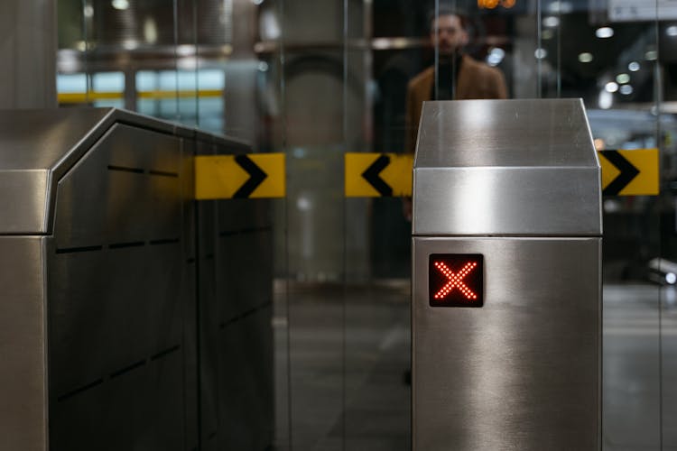 Automatic Entrance Ticket Gate At Subway Entrance With An LED X Sign