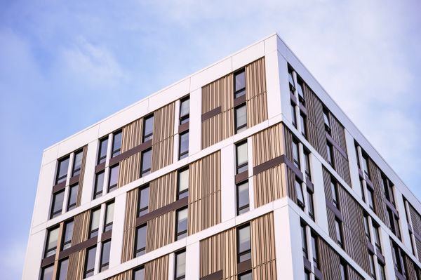 Apartment tower facade seen from below, photo by Brett Sayles on Pexels