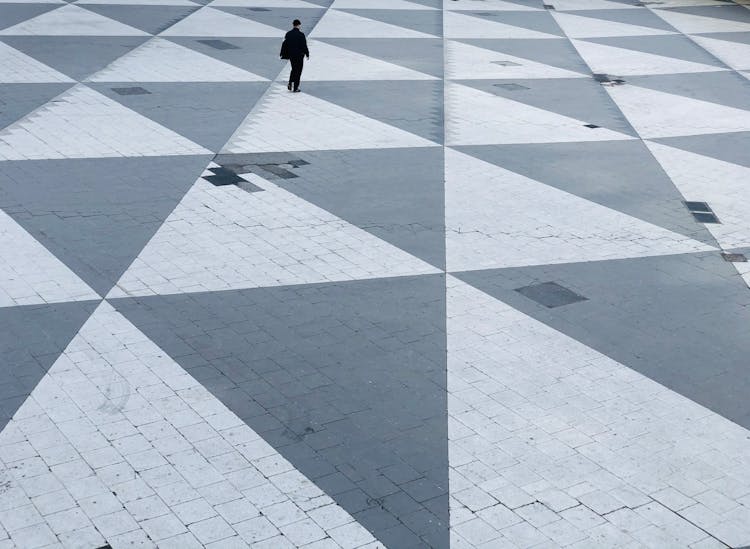 A Person Walking The Pedestrian Plaza Of Sergels Torg In Norrmalm, Stockholms, Sweden