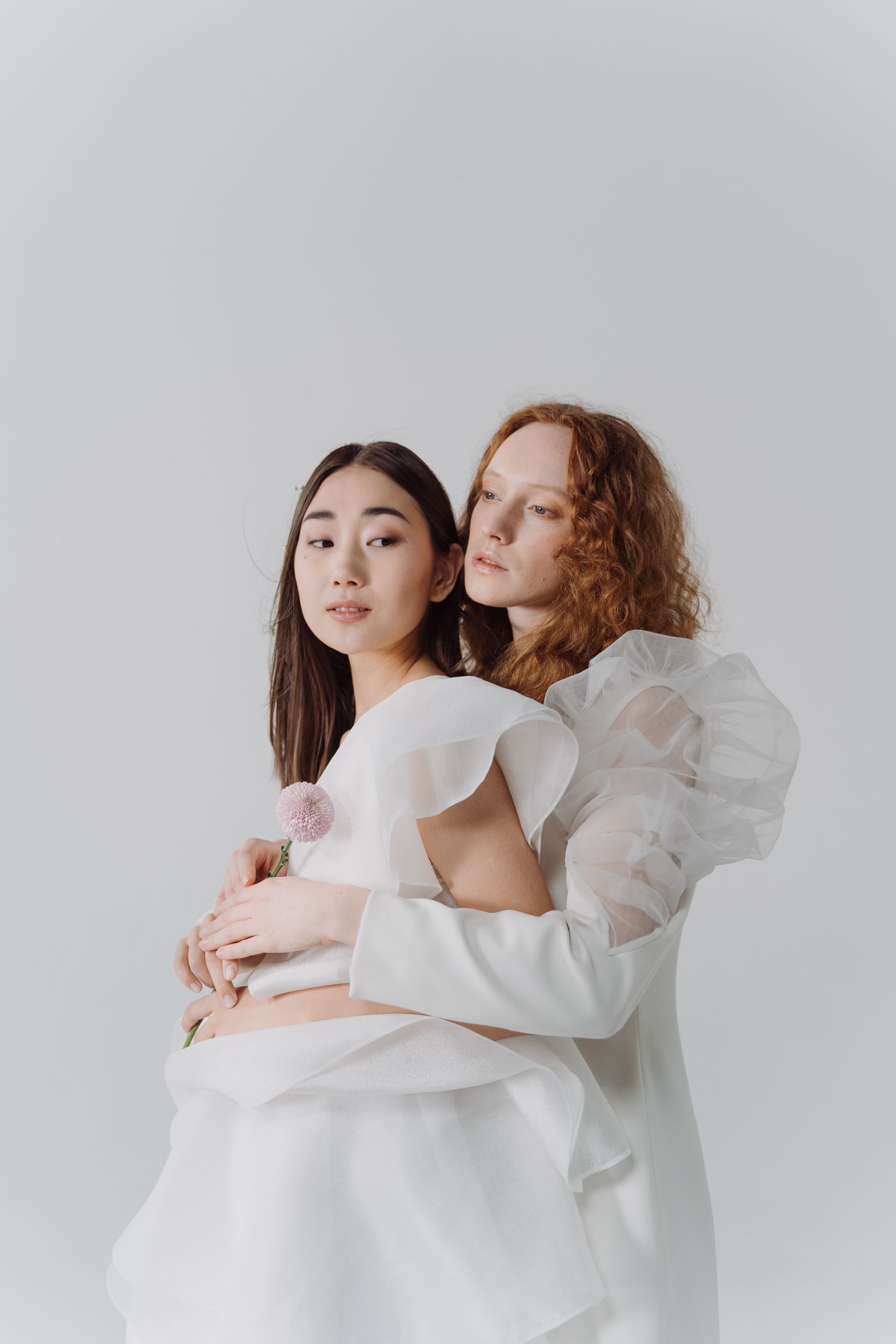 Two Women Wearing White Dresses · Free Stock Photo