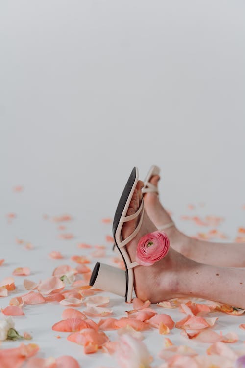 Person Wearing Sandals with Pink Flower · Free Stock Photo