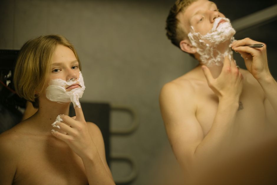 Two brothers engaging in a morning shaving routine, enhancing brotherly bonds.