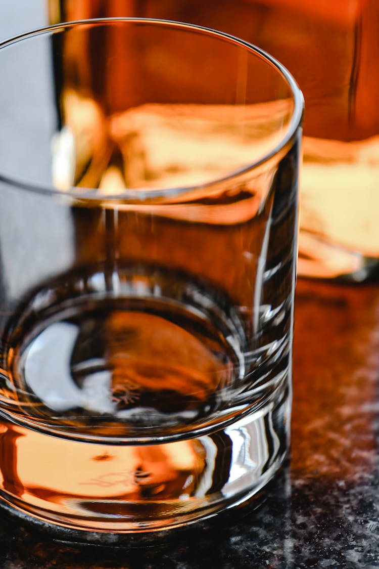 An Empty Whisky Glass In Close-up Photography