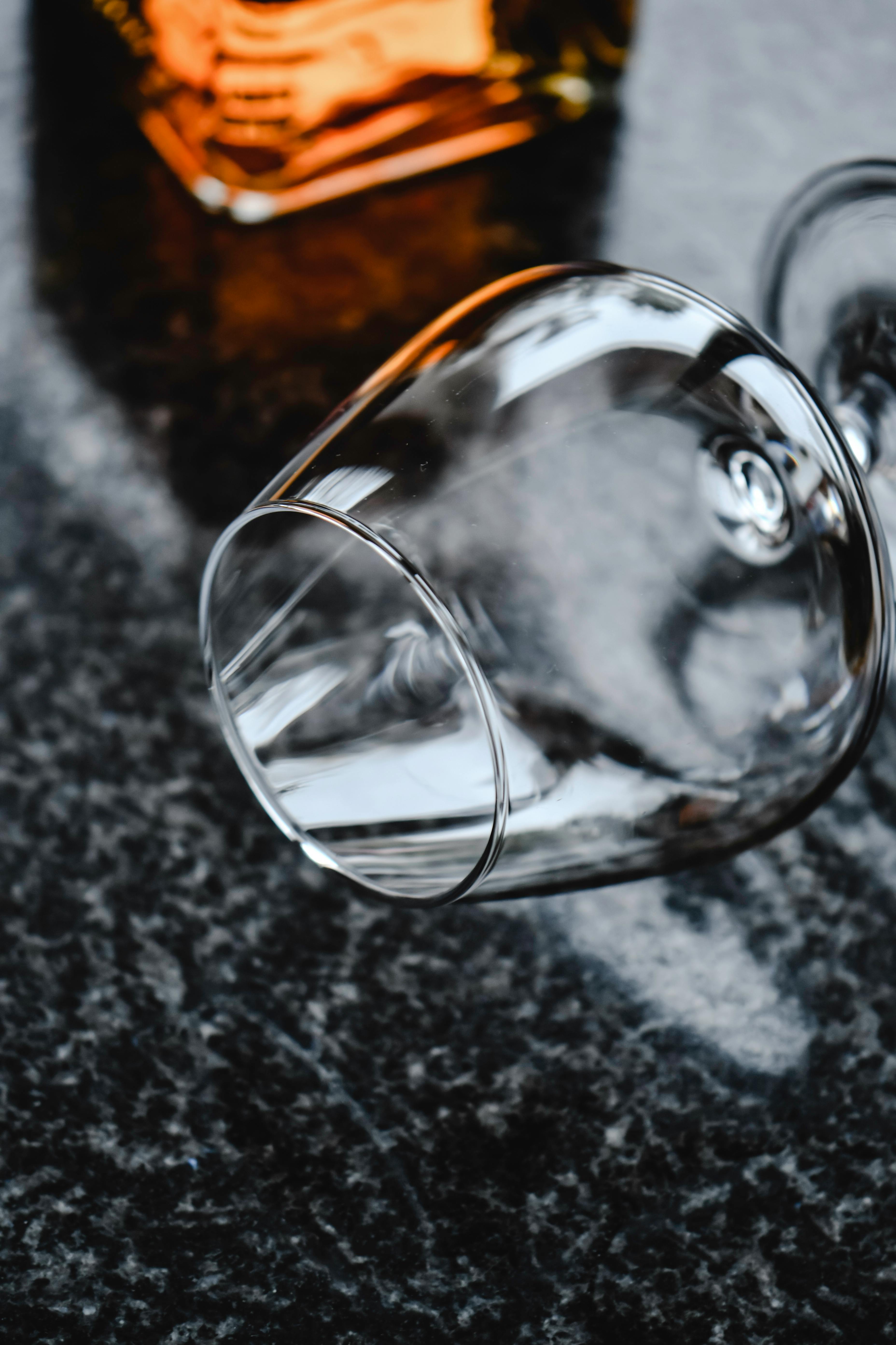 Clear Drinking Glass on a Marble Surface · Free Stock Photo
