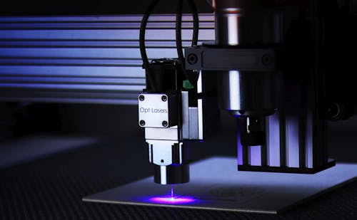 Free Laser Light on a Cutting Equipment Stock Photo