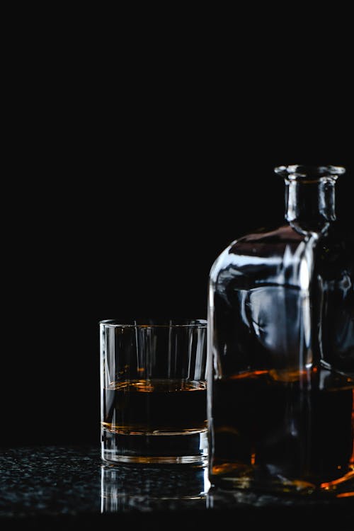 Free Photo of a Glass with Brown Liquor Stock Photo