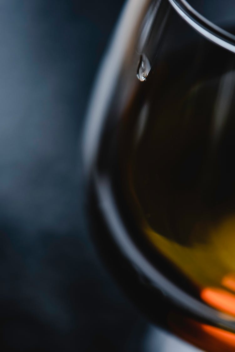 A Drop Of Water On A Glass Surface