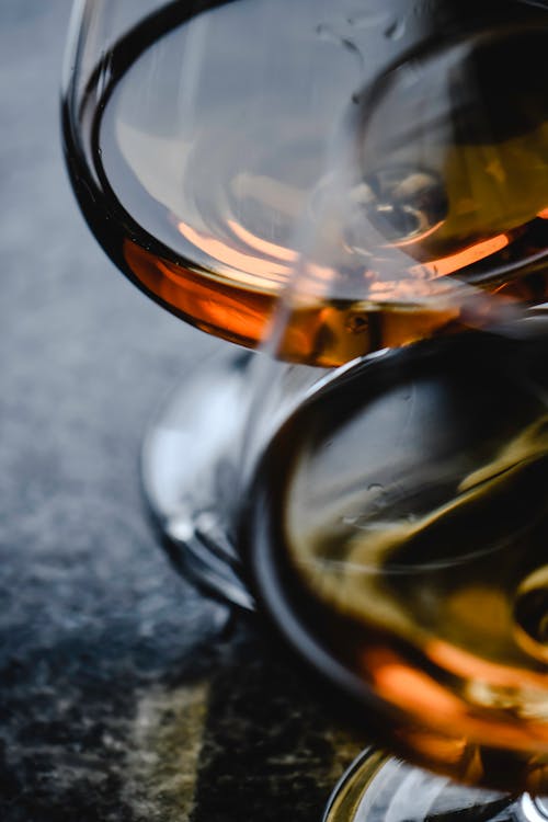 Close-Up Photo of Whiskey in Glasses