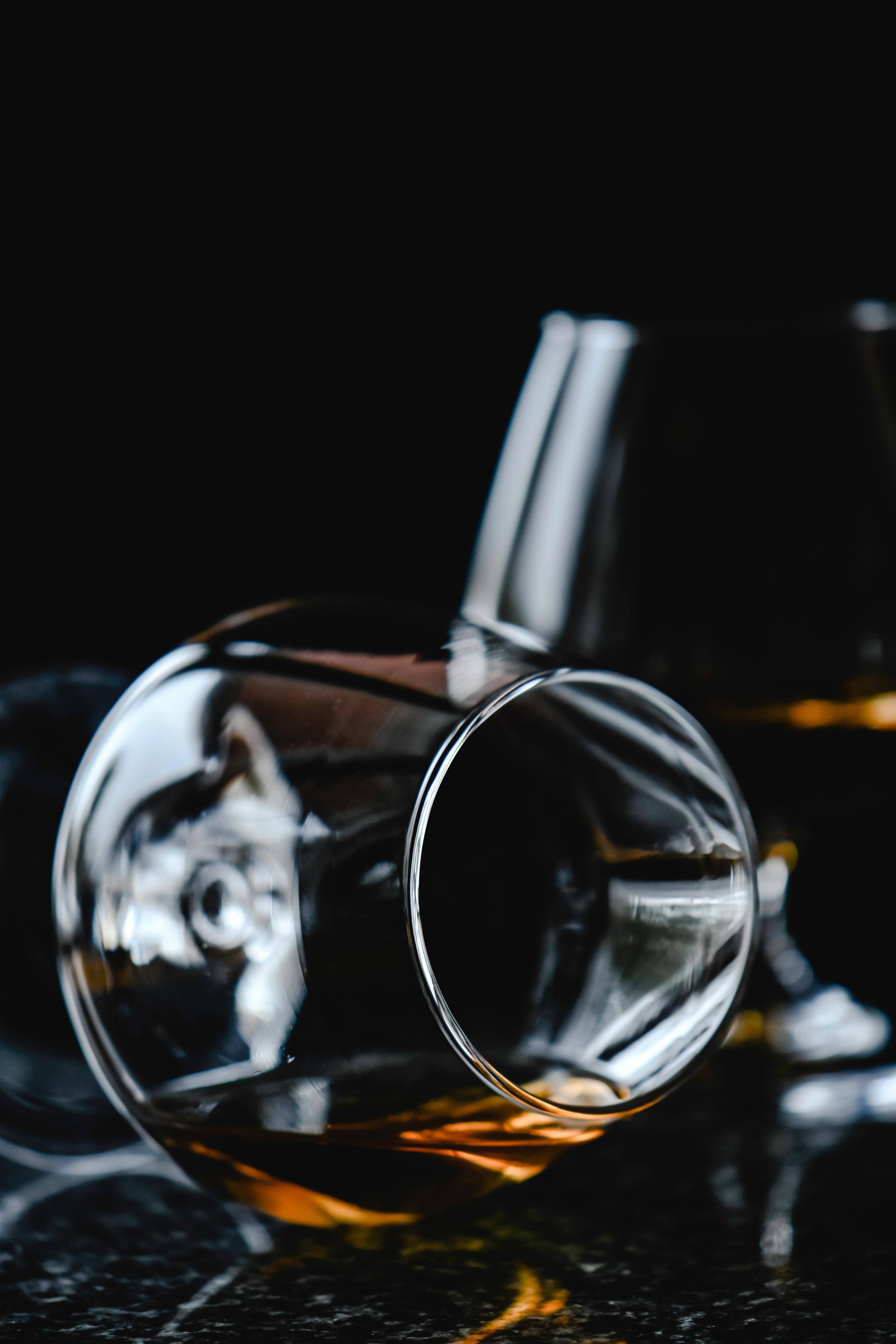 CloseUp Shot of Alcoholic Drink in a Snifter Glass · Free Stock Photo