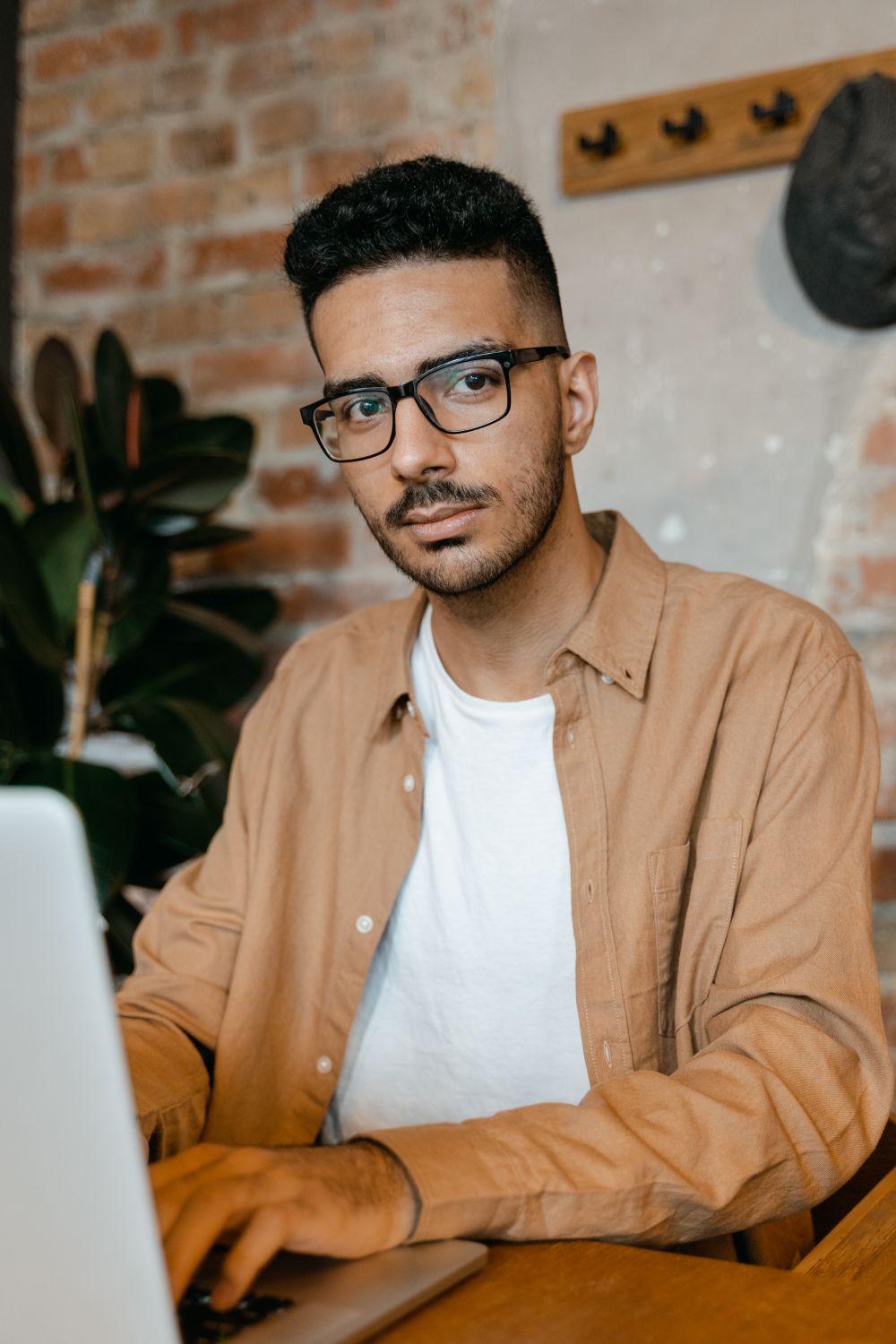 Indian entrepreneur working on a laptop