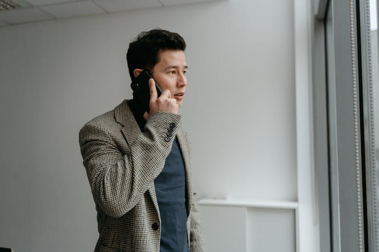 A Businessman On A Phone Call 