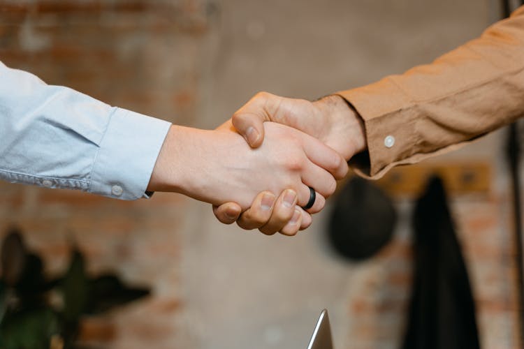 Close-Up Shot Of A Handshake