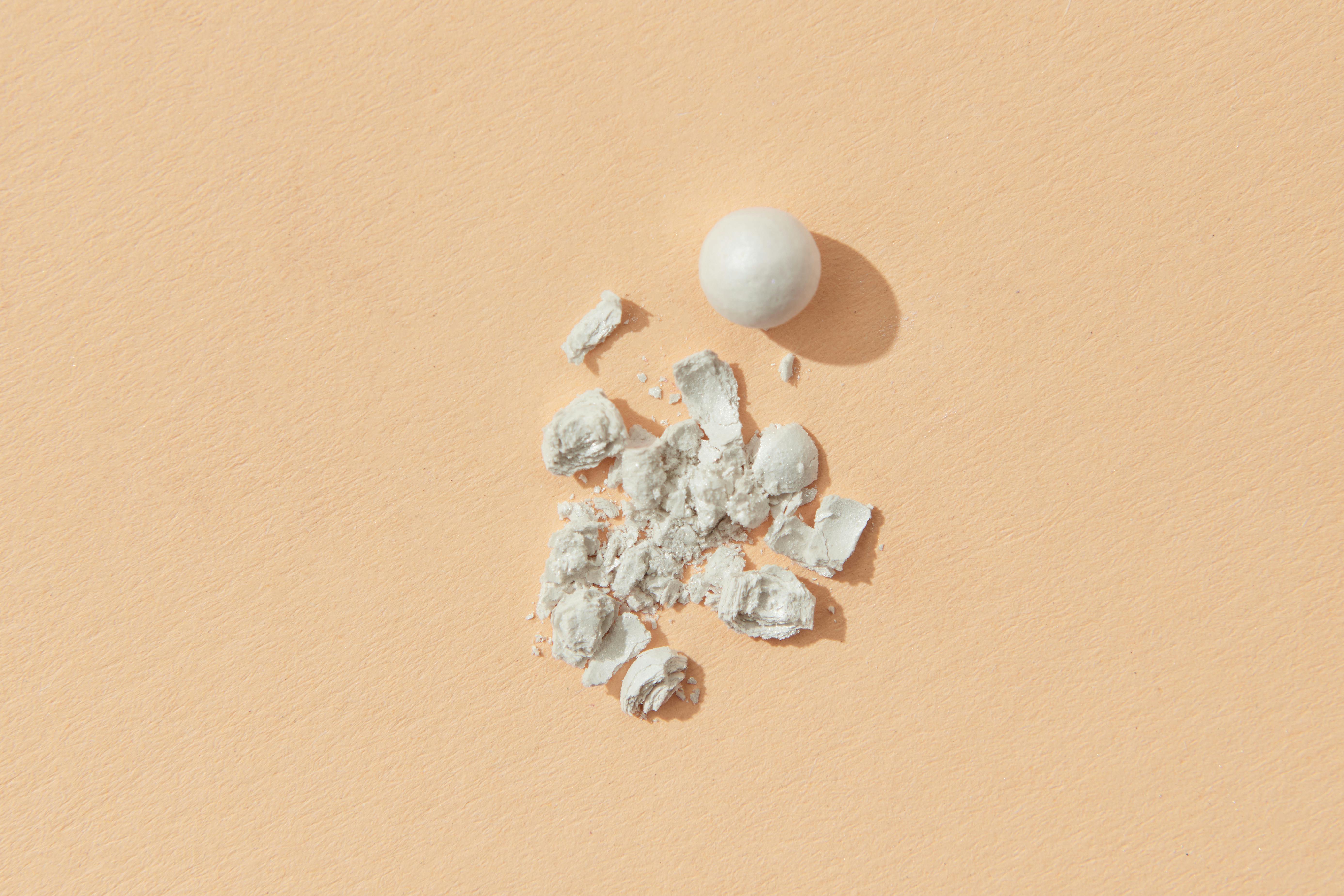 White Powder on Yellow Surface · Free Stock Photo