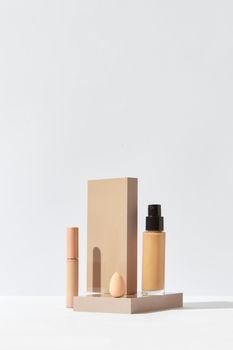 Elegant arrangement of beauty products with clean, minimalist design.