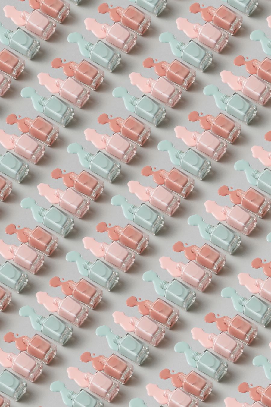 Pastel bottles arranged in a pattern