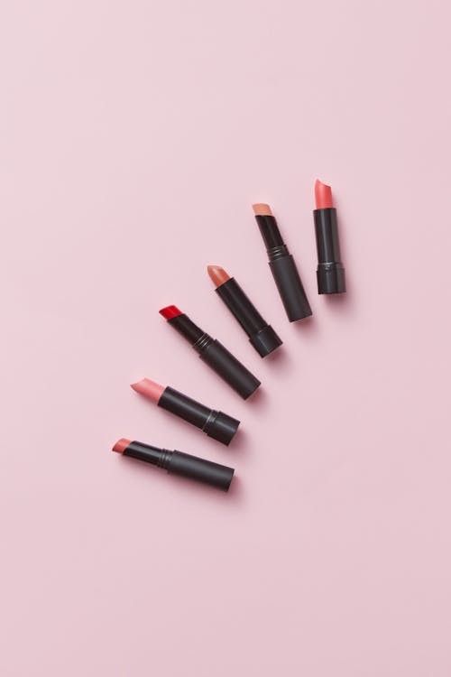 Free  Lipsticks on Pink Surface Stock Photo
