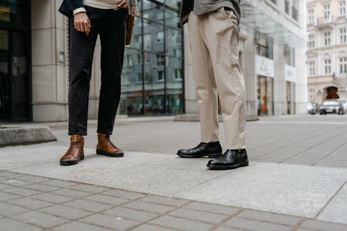 Free Men Wearing Long Pants and Leather Shoes Stock Photo