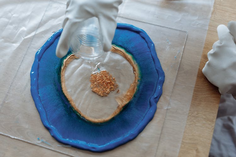 A Person Pouring Resin 