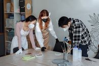 A Group of People Making Resin