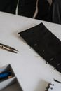 Black textile with sewing pins in studio