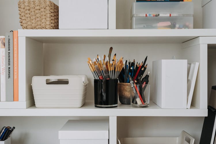 Art Supplies On Shelves In Studio