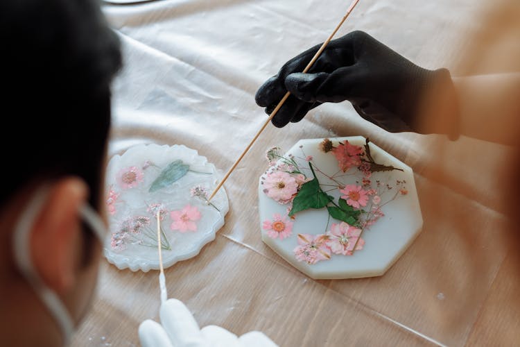 People Arranging Dry Flowers 