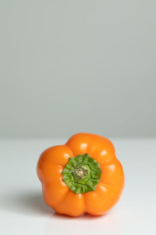 Close-Up Photo of an Orange Bell Pepper