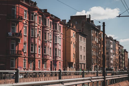 Vibrant urban street scene featuring colorful apartment buildings in Sofia, Bulgaria.