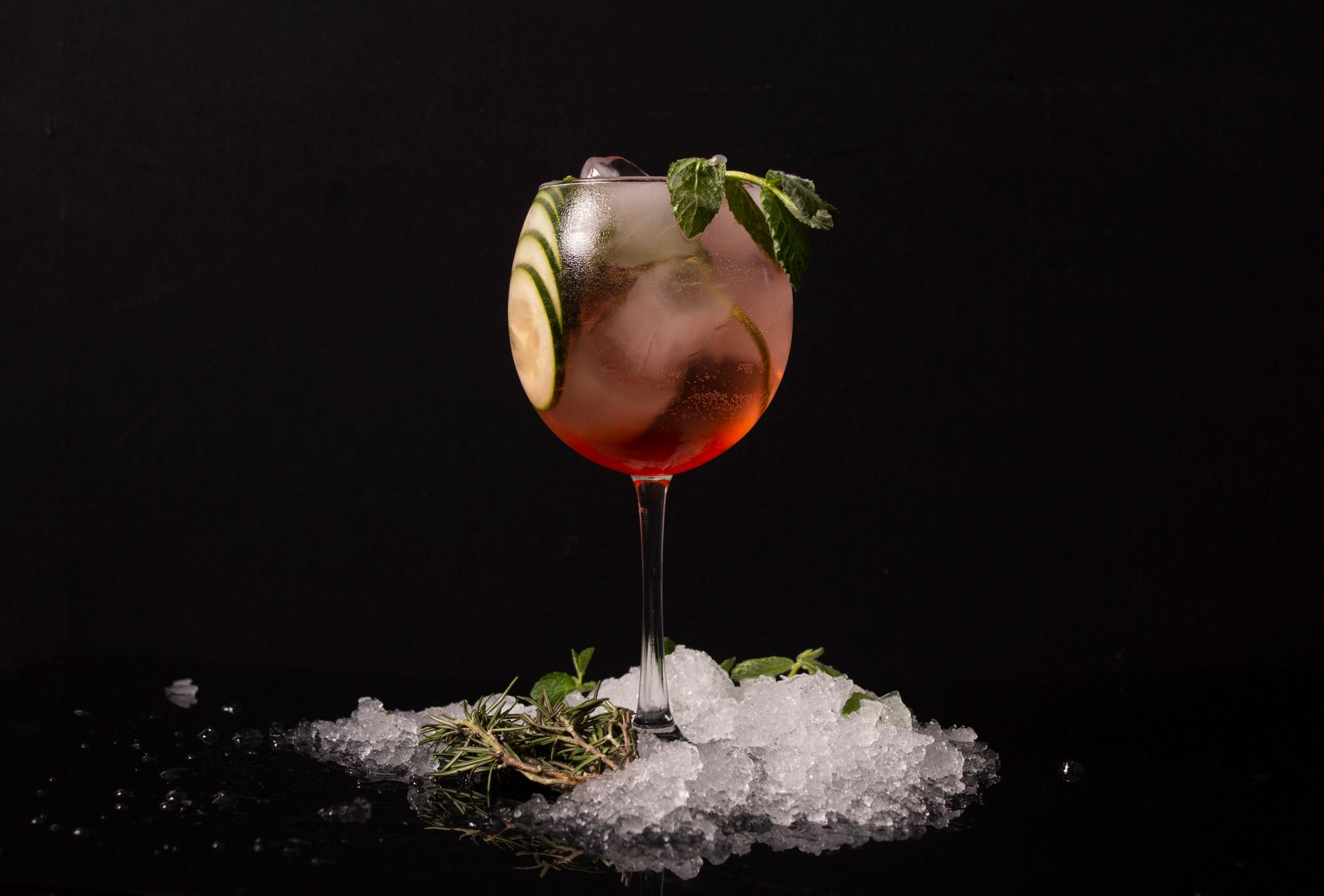 Refreshing Cucumber Gimlet cocktail with cucumber slice
