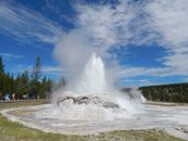 White Liquid Bursting from Concrete Basin