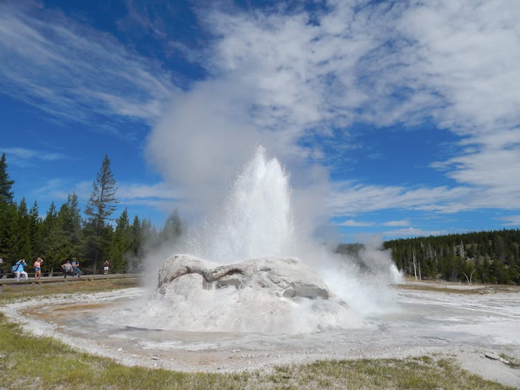 White Liquid Bursting From Concrete Basin