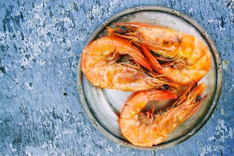 Three Cooked Shrimps On Can