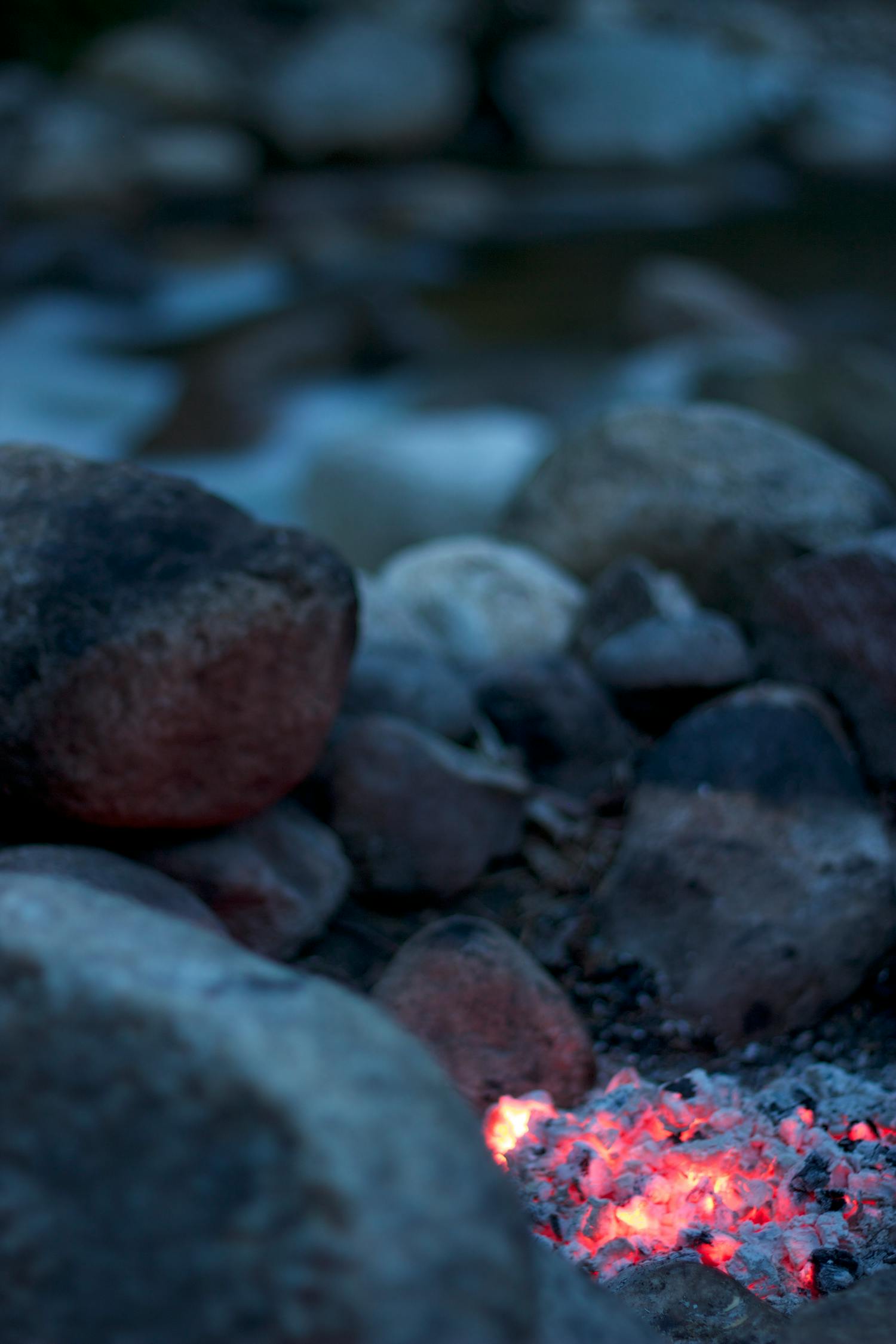 Burning Firelog Surrounded of Pebbles · Free Stock Photo