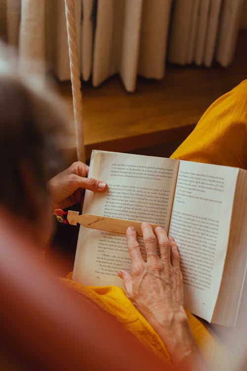 Free Person Reading a Book Stock Photo